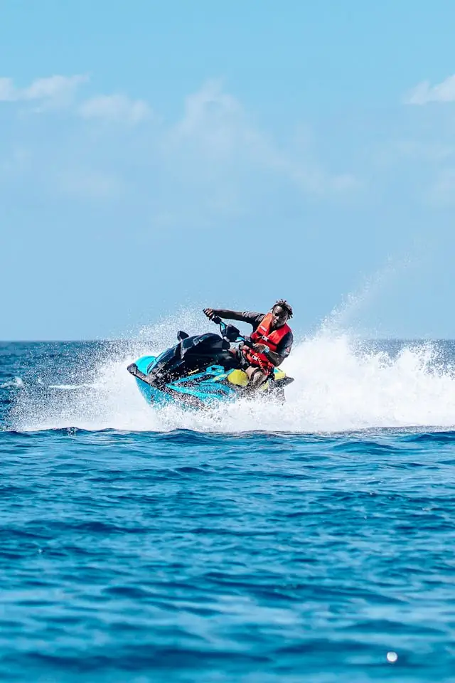 Person riding a jet ski on the ocean in Hawaiʻi