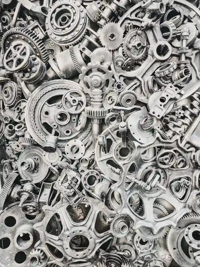 A collection of metal machine parts